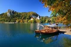 Its many charms include a medieval castle, perched high on a rocky cliff, a scenic lake studded by a tiny wooded island, and the alpine splendour of the nearby Triglav National Park, a natural