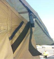 (Fig J) Slide base of rod through grommet and into base of tent, make sure rod is