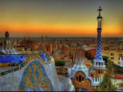 Overnight in Barcelona Sagrada Familia Parc Guell Barcelona is located in the northeastern part of the country, 90 miles south of the French border.