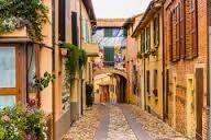 provides a full-day excursion to Ravenna Walk through the medieval village of Dozza, known for its murals