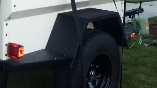 M-Series tubs use external fenders bolted to the side of