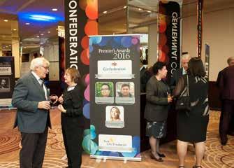 ) Company gobo (logo spotlight) projected on foyer and ballroom wall Company logo in a post-event advertisement featuring award recipients