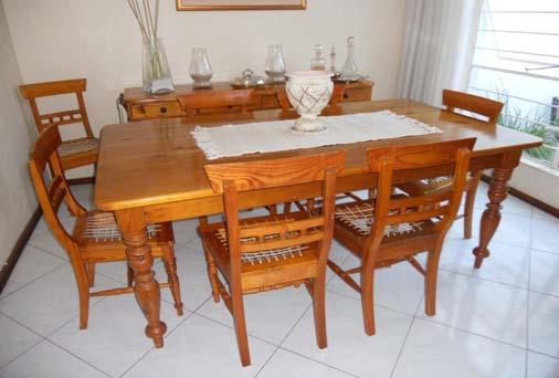FOR SALE: Beautiful Oregon Pine table with large side board as per photo including 8 chairs. In good condition. Price for all Zar 6000.