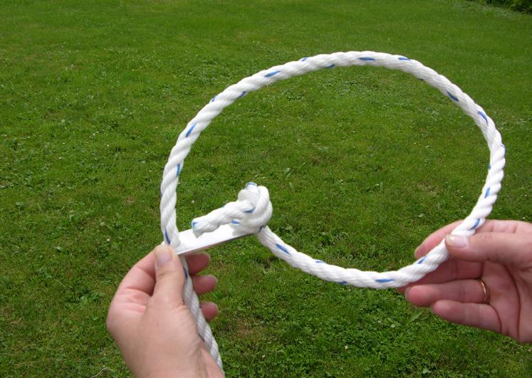 Tie a knot in the end of the rope. Repeat with remaining guy ropes and sliders. **Can't find the sliders?