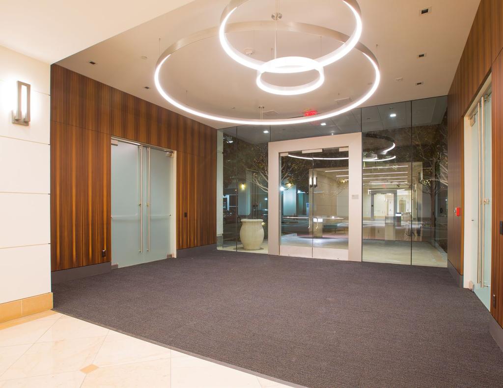NEW LOBBY FINISHES NEW CONTEMPORARY LED LIGHTING ELEMENTS WOOD FEATURE