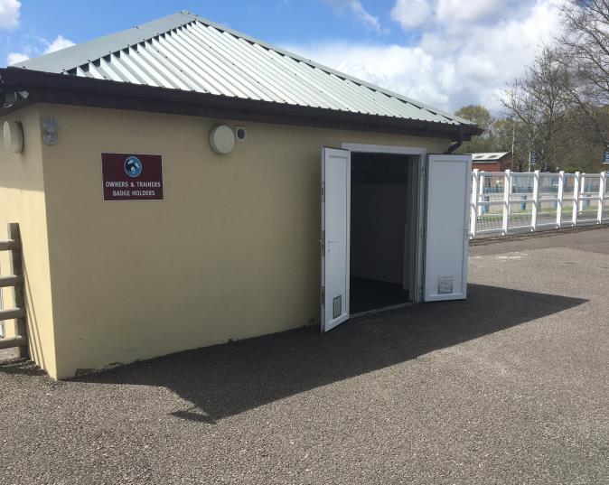 Owners / Trainers / Officials Entrance: This entrance is on ground level and is a level walkway.