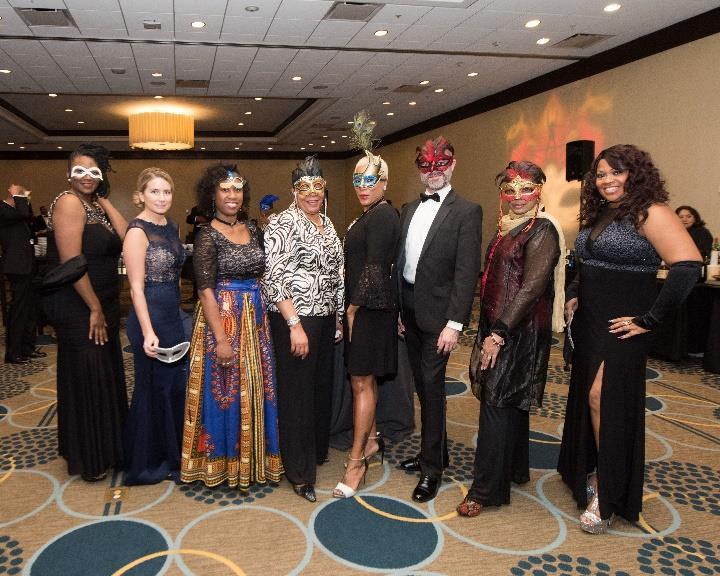company logo on signage and on sponsor video scroll during the 2018 UNCF Mayor s Masked Ball Company logo featured