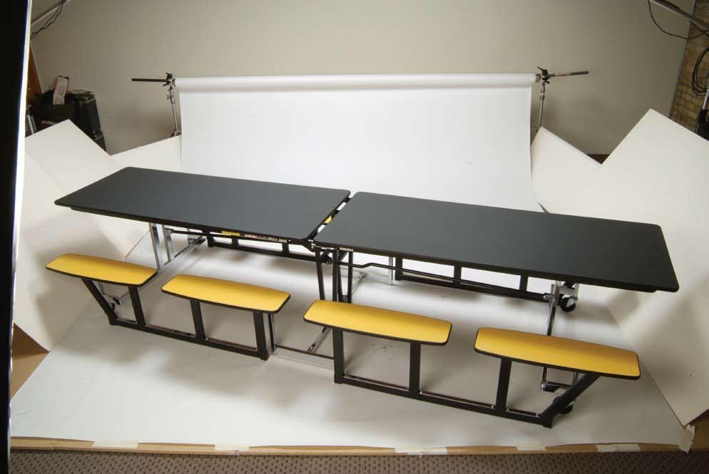 NP Series This table features a bench design for convenient center accessibility.