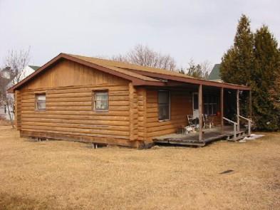 Cadotte Avenue- Unique 2 bedroom, full basement log home situated on a large, fenced in lot. There is a separate 1 bedroom cottage on property. Apx. 950 sq. ft.