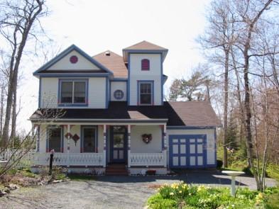 Listing courtesy of Murray's Mackinac Realty Offered at $850,000 Woodbluff Woodbluff-This 4 bedroom, 3 bath home is nestled on a heavily wooded 100 x100 lot with a