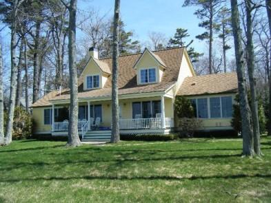 carriage home/game room and winterized office/gazebo with a large sun deck. Overlooks the Straits of Mackinac with views of the Mackinac Bridge, St.