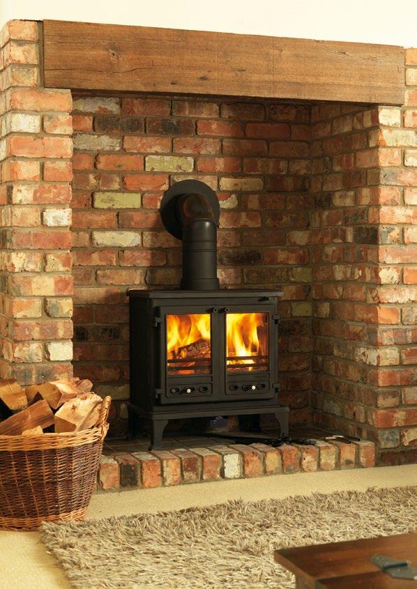 FIREFOX STOVE FIREFOX 12B BOILER STOVE SHOWN IN TRADITIONAL COTTAGE BRICK FIREPLACE OUTPUT TO WATER OUTPUT TO ROOM THE FIREFOX 12B IS EQUIPPED WITH AN EFFICIENT Nominal output when