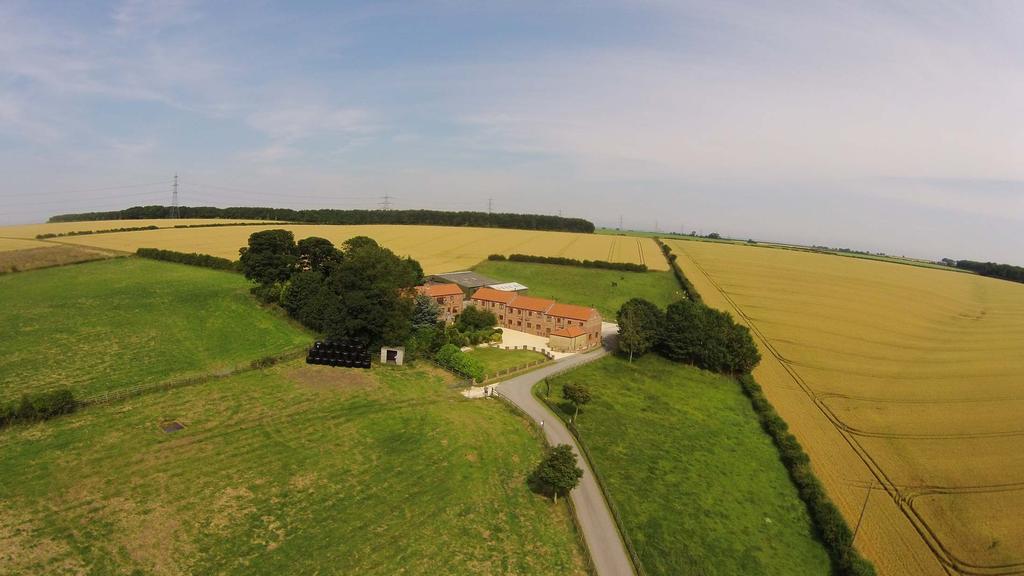 DESCRIPTION / BACKGROUND Red House Farm is an immaculately presented lifestyle property situated in a beautiful rural location yet only 5 miles from the popular county town of Beverley.
