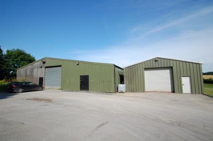 BUILDINGS Situated to the east of the house and north of the holiday cottages is a useful range of modern general purpose buildings situated on tarmac yard area.