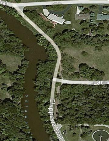 There is a walking loop path and two parking areas, along with several park amenities. There is no designated canoe or kayak launch.
