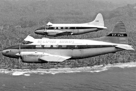 Another view from the same air-to-air sequence off Honiara on VP-PAA's last flight. VP-PAA is being flown by Graham Syphers, VH-RUN by John Seaton. Both photos via Graham Syphers DH.