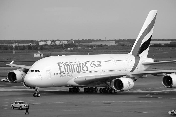 2 Refer to Fig. 2, a news item about Emirates.