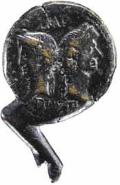 Sl. 10. Rimski provincijalni denar iskovan u Nemauzu (Rowan 2010: 10, fig. 4) kojih se apotropejska uloga može potvrditi ili pretpostaviti s većom sigurnošću, često dolaze u paru s kovanicama.