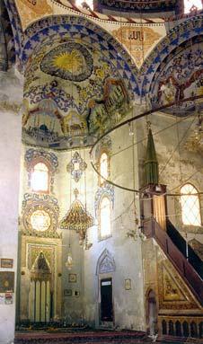 The dome, the half dome and the four corners of the cubic structure are covered with lead. The marble minbar is decorated by painting with floral motives and has a wooden handrail.