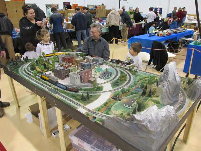 Contest: 12 x 12 inch Diorama of your choice Clinic: MMR Don Cook s slide presentation on CNW System Wide One of the goals of this year s High Wheeler Train Show was to get kids involved in running