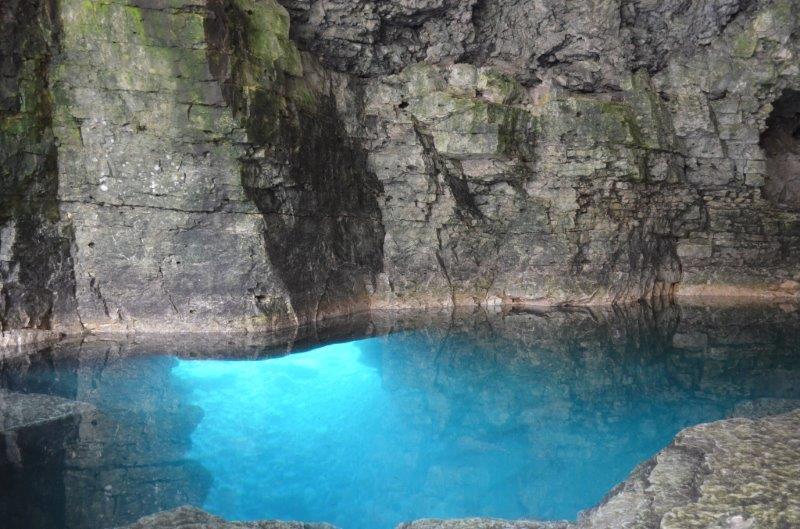 An underwater cave with sapphire blue water at Bruce Peninsula National Park.