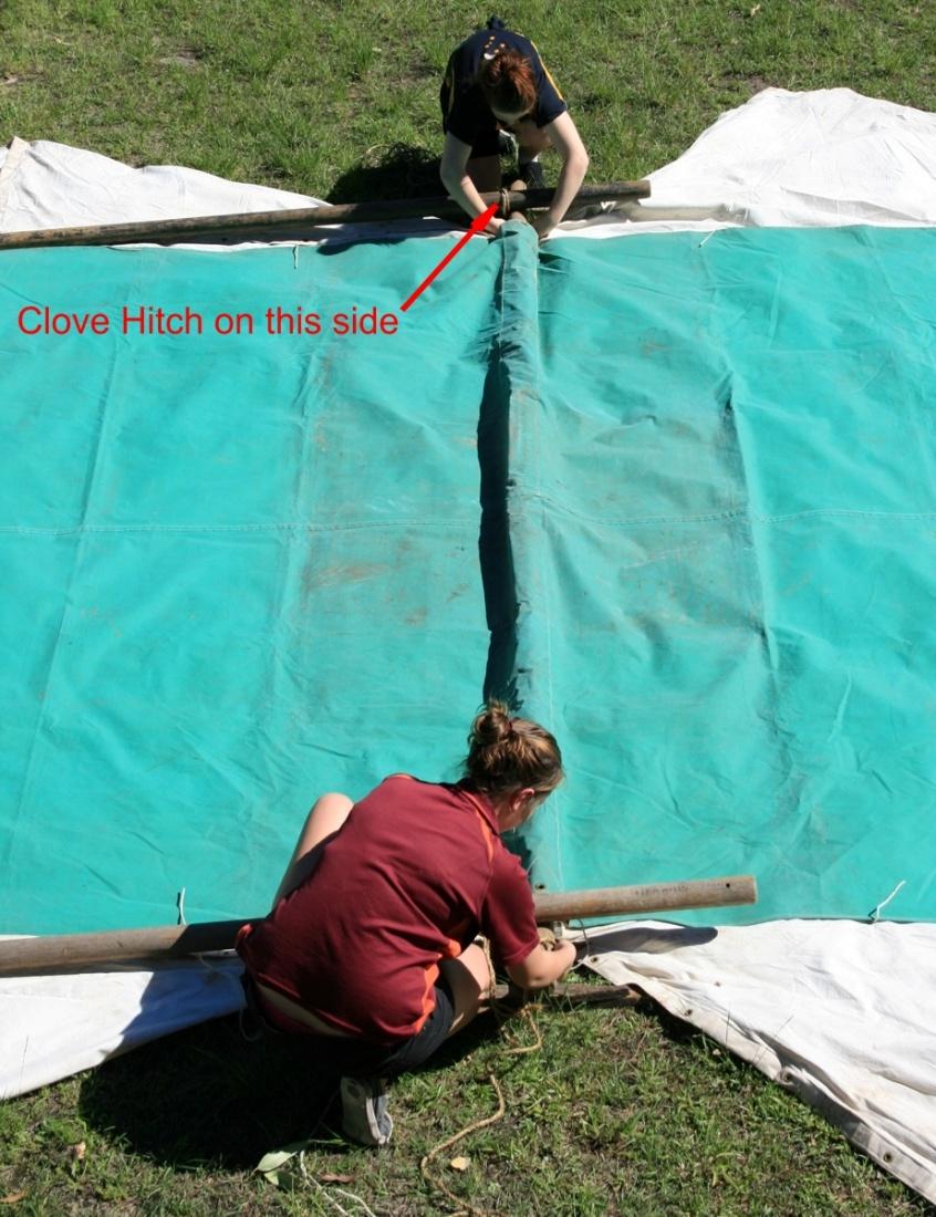In this position the bottom edge of door flap indicates where ground level will be when the tent is erected.