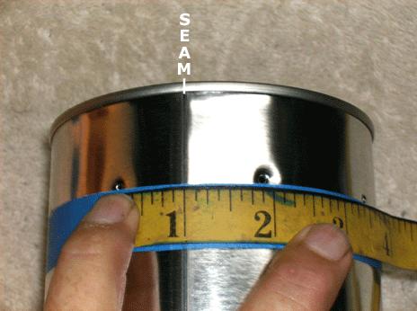 Next place the remaining holes 1-5/8" apart around the can. This will give you 8 evenly spaced holes around the can.