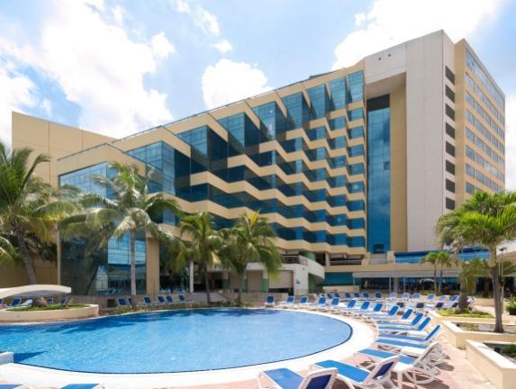 84" W Description The H10 Habana Panorama is a benchmark hotel in the Cuban capital thanks to its impressive architectural design and its preferential location facing the sea in the residential area