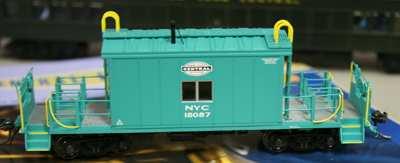 ) Paul Runyan brought in three HO scale freight cars: 1.