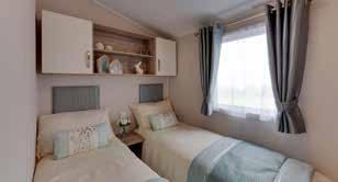 Extra kit and features include galvanised chassis, electric fire, swivel chair, co-ordinated bed covers and full length fixed front window.