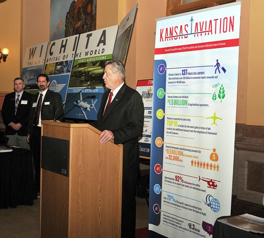 Lands More Attendees The third annual Aviation Day at the Capitol arrived on February 9th with more than 29 exhibitors and several speakers ranging from KDOT Secretary Richard Carlson to FAA Regional