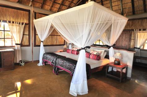 Our eight private safari chalets have been built on raised wooden platforms and have thatched roofs. They are tastefully decorated with African style and charm.