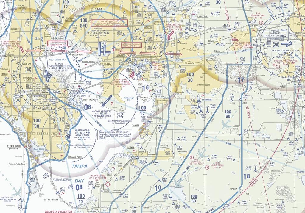 VFR ARRIVALS OVERVIEW 2600 MSL KIDNEY LAKE N28 03 40 W82 16 31 MACDILL AFB 13NM @ 200 1000 MSL PRIOR TO REACHING I-75 CAUTION: STAY ALERT FOR CONVERGING TRAFFIC CAUTION: TV TOWERS 1667 MSL AND BELOW