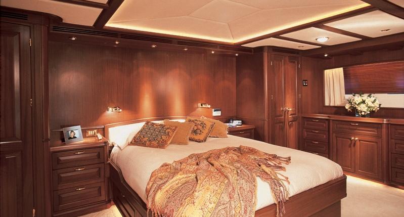 The Master stateroom features a queen-size bed, settee, dressing table and two wardrobes.