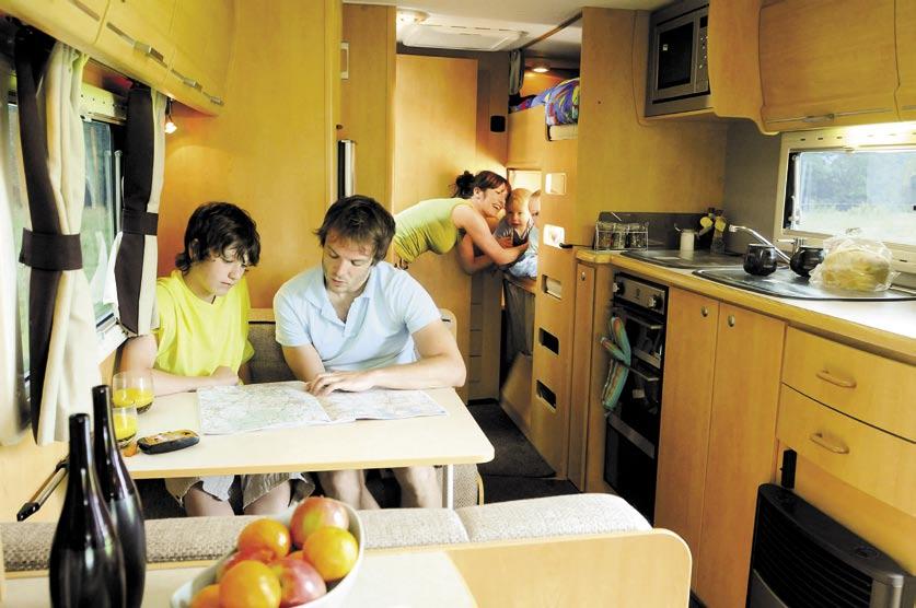 GREA RIPLE-BUNK CARAVANS WINNER Best Family Caravan over 13,500 Crusader empest because families eat together 19,995 RUNNER-UP Caravan of the Year he wardrobe next to the triple bunks is massive,