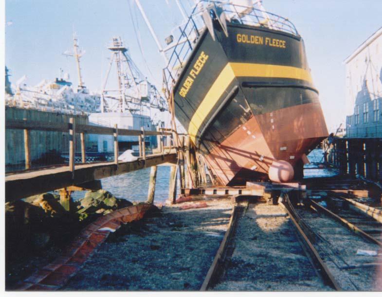 This large Alaskan fishing vessel became stranded on top of the wreckage of a marine railway when the ways collapsed under the weight of the vessel, approximately 450 tons.