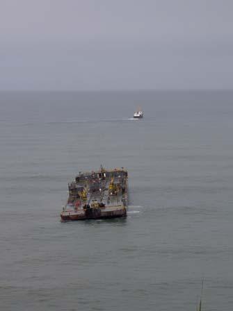 called in the Company s 202 foot salvage vessel the M/V Salvage Chief to winch the Millicoma from the rocky cove.
