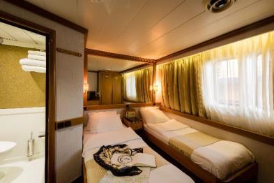 THE MOTOR SAILER PANORAMA CABIN SPECIFICATIONS: The PANORAMA s 24 cabins are located on 3 decks and are finished with wooden furniture and light fabrics.