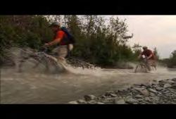 00:00:10:07 N Clip #: 635 YT-HD-001 Yukon Territories: Static medium shot of four mountain bikers