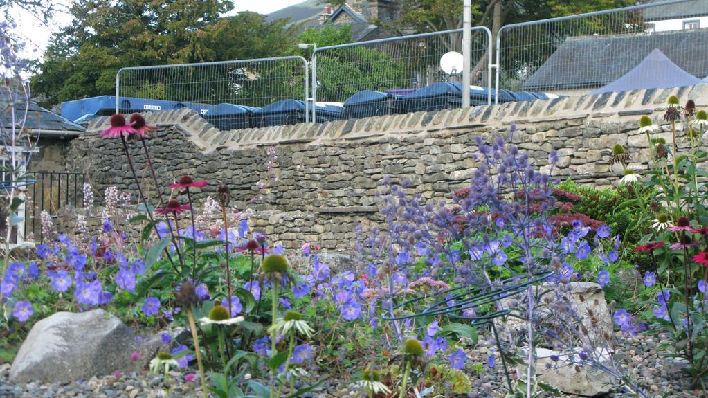 Improve the appearance of towns and villages: Enhancement works to Sedbergh Information Centre Garden ( 5,000) Enhancement works to improve links between the garden and the Joss Lane market area,