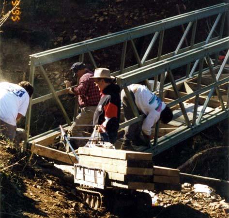 In December of 1995, Bellfree Construction completed installation of the 25' fiberglass and wood bridge at Spanish Gulch.