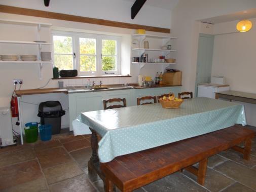 Large Farmhouse Kitchen Beyond the kitchen is the boot room with lots of space for wellington boots and wet weather gear as well as