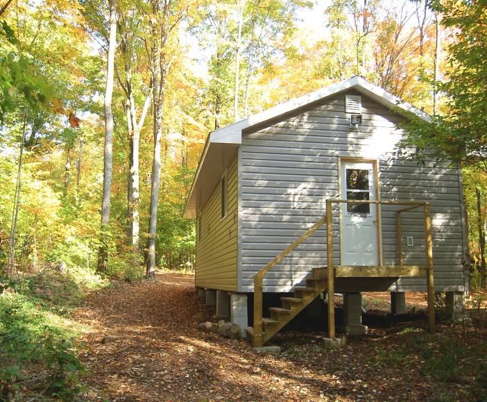 There are roads and trails throughout the site so families may easily drive from their cabins to the various locations on the site.