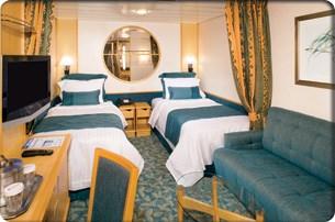 ) Oceanview Stateroom This stateroom features two twin beds that may be converted into one queen-size bed,