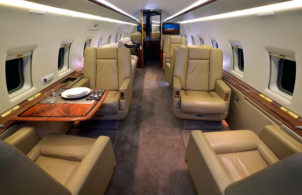 INTERIOR Forward Cabin INTERIOR DESCRIPTION (Refurbished in July 2012 at West Star Aviation Grand Junction, CO) This nine passenger executive interior features a forward four-place club seating with
