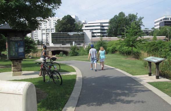 Photo Credit: ITRE PIEDMONT REGION 6 Little Sugar Creek Greenway Located near Downtown Charlotte, this greenway offers a quiet retreat for joggers, bicyclists, and pedestrians.