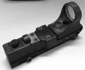 06" diameter Flashlight mount locks in any of five positions allowing the flashlight to be mounted on either side of the pistol or rifle.