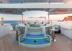 with a three-tiered waterfall surrounded by a stylish bar on sundeck Upper aft deck features