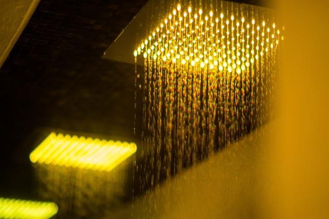Chromotherapy showers Mood enhancing LED lights in showerheads Gives the user a shower of colour Hot and cold water Celestial relaxation room Ambient temperature Sea breeze fragrance Planetary audio