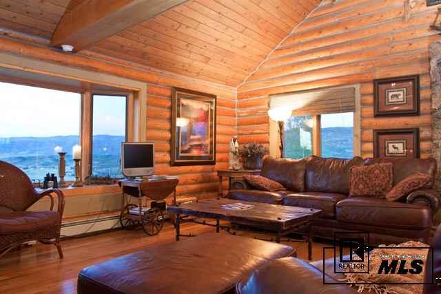 REMARKS Gorgeous log home on